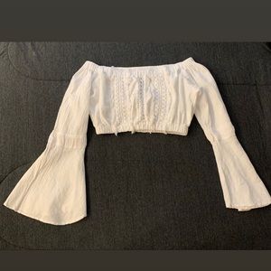 white cropped long sleeve top size large from cotton natural fits small